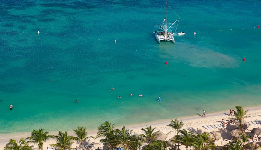 Catamaran anchored in turquoise water